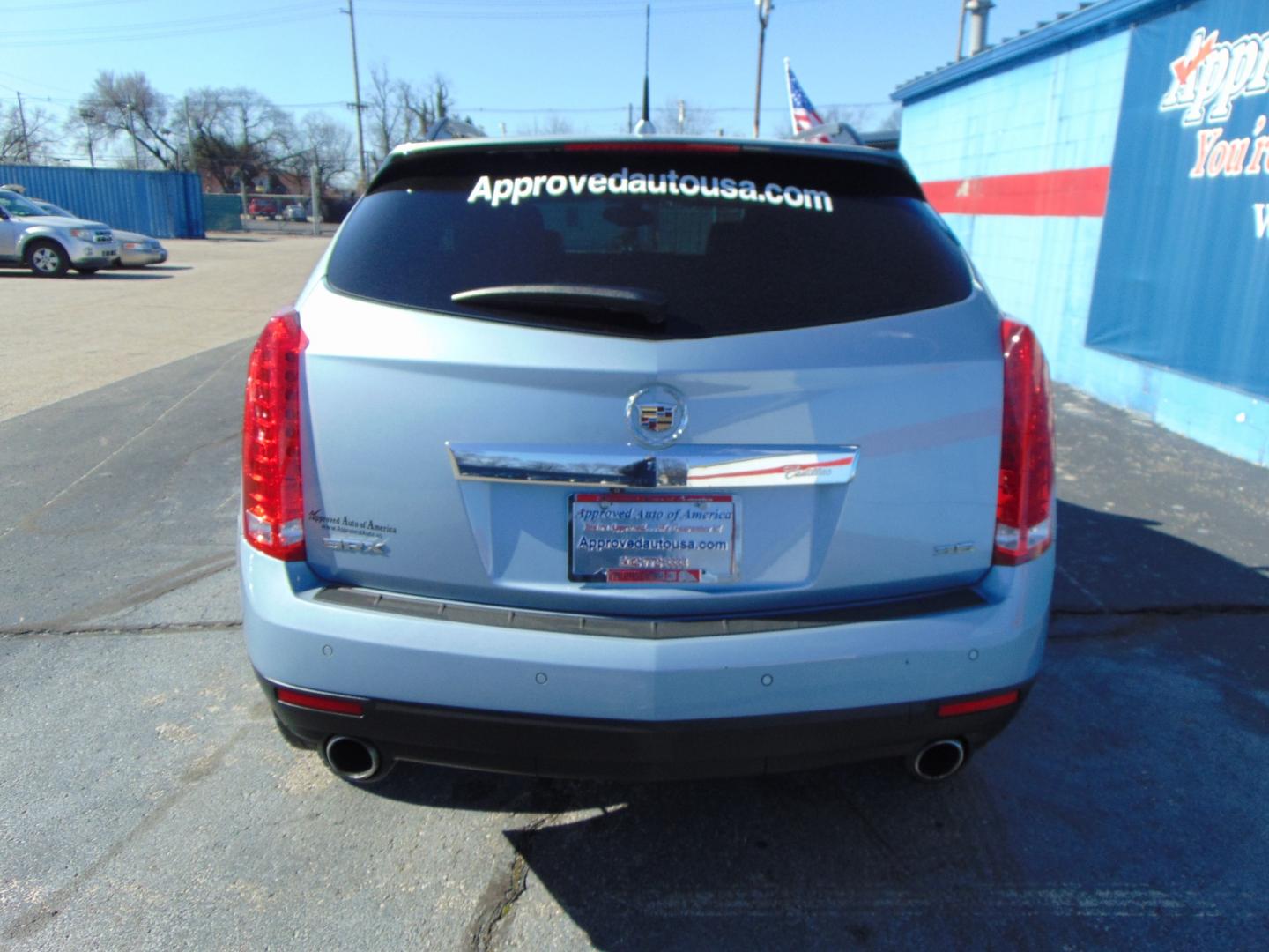 2013 Blue Cadillac SRX (3GYFNCE3XDS) with an V6 Flex Fuel 3.6 Liter engine, Auto, 6-Spd w/TAPshift transmission, located at 2105 Dixie Hwy, Louisville, KY, 40210, (502) 772-3333, 38.220932, -85.795441 - Photo#11